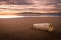 Bottle on the beach with important message Royalty Free Stock Photo