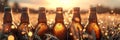 Bottle with beer against wheat field on sunset. Field of barley on summer or autumn day. Brewing Royalty Free Stock Photo