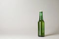 Bottle of beer on grey background Royalty Free Stock Photo