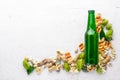 A bottle of beer, hops and grain. Top view Royalty Free Stock Photo