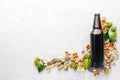 A bottle of beer, hops and grain. Top view Royalty Free Stock Photo