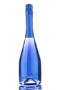 Bottle of blue sparkling wine isolated on white. Vertical format. Romantic present. Close up Royalty Free Stock Photo