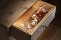 Bottle brandy and glasses in a drawer Royalty Free Stock Photo