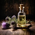 Bottle of burdock plant oil on wooden backgrounds