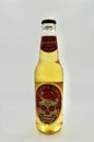 A bottle of Calaverita beer against a white background