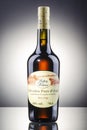 Bottle of calvados on gradient background