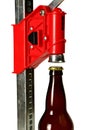 Bottle Cap Press with Bottle for Homebrew Beer, Close Up Royalty Free Stock Photo