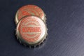 Bottle caps of Desperados beer. Royalty Free Stock Photo