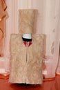 A bottle of champagne dressed in sheep`s wool