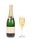 Bottle of champagne and full glass. Royalty Free Stock Photo