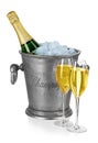 Bottle of champagne in ice bucket with stemware isolated Royalty Free Stock Photo