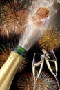 Bottle of champagne with popping cork Royalty Free Stock Photo