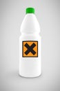 Bottle of chemical liquid with hazard symbol