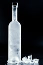 Bottle of cold vodka on dark background Royalty Free Stock Photo