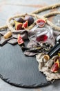 Bottle, corkscrew, glass of red wine, figs on a table Royalty Free Stock Photo