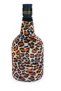 Bottle is covered with a leopard coloring