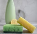 Bottle of dish detergent, fluid hygiene , detergent cleanup chemical sterilize sponge on a light background