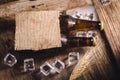 Bottle Draft Beer and ice on wooden table Royalty Free Stock Photo