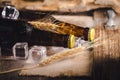 Bottle Draft Beer and ice on wooden table Royalty Free Stock Photo