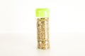 Bottle of dried oregano leaves Royalty Free Stock Photo