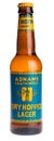 Bottle of English Adnams Dry Hopped Lager beer isolated on white