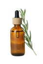 Bottle of essential oil and fresh rosemary isolated on white Royalty Free Stock Photo