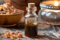A bottle of essential oil with myrrh resin Royalty Free Stock Photo