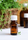 Bottle of essential thyme oil Royalty Free Stock Photo