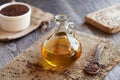 A bottle of flax seed oil with flaxseeds Royalty Free Stock Photo