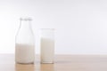 Bottle of fresh milk with glass alongside Royalty Free Stock Photo