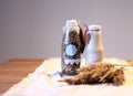 Bottle of fresh milk with Oat and whole wheat grains flake on wooden table. Bottle muesli with berries and bottle of Royalty Free Stock Photo