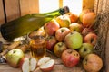 Bottle and glass of cider with apples Royalty Free Stock Photo