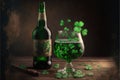 Bottle and glass with green beverage and many shamrocks. Irish drink symbol of Saint Patrick's day