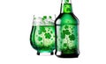 Bottle and glass with green beverage and many shamrocks. Irish drink symbol of Saint Patrick's day