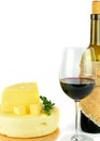 Bottle with glass of red wine and cheese isolated on white Royalty Free Stock Photo