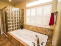 Bottle Glass Shower & Bathtub In Modern Bathroom Royalty Free Stock Photo