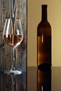 Bottle and glass of white wine on a black table Royalty Free Stock Photo