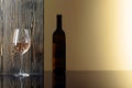 Bottle and glass of white wine on a black table Royalty Free Stock Photo