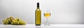 Bottle and glass of white wine with grapes Royalty Free Stock Photo