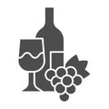 Bottle, glass of wine and bunch of grapes solid icon. Wine with wineglass and grape glyph style pictogram on white Royalty Free Stock Photo