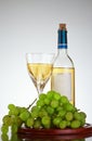Bottle and glass of wine, grape bunch Royalty Free Stock Photo