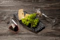 A bottle and glasses of red and white wine with fruits Royalty Free Stock Photo