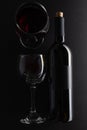 Bottle and glasses with red wine on dark grey background. Wine banner. Space for text. Template concept for your design and Royalty Free Stock Photo