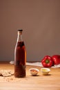 Bottle of hot pepper oil with oil, chilli, red peppers and crackers Royalty Free Stock Photo