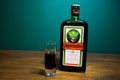 Bottle of Jagermeister alcohol drink, German digestif made with 56 herbs and spices. Royalty Free Stock Photo