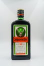Bottle Jagermeister, herbal aroma liqueur. Drink has alcohol herbs and spices. Digestif, aperitif Royalty Free Stock Photo