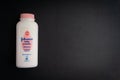 Bottle of Johnson & Johnson baby powder on black background