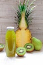 Bottle of kiwi, pineapple, pears juice.