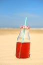 Bottle lemonade at beach Royalty Free Stock Photo