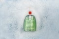 A bottle of Liquid soap floating in soapy water. Harmful composition of ingredients, detergent with SLS, Propylene Glycol, TEA,